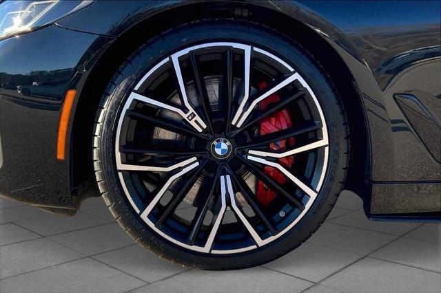 used 2022 BMW M550 car, priced at $54,998