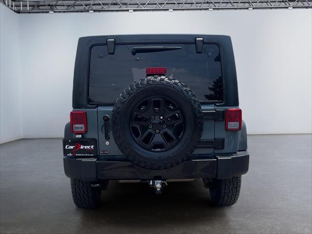 used 2014 Jeep Wrangler Unlimited car, priced at $17,399