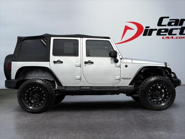 used 2011 Jeep Wrangler Unlimited car, priced at $14,977