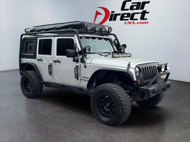 used 2012 Jeep Wrangler Unlimited car, priced at $18,512