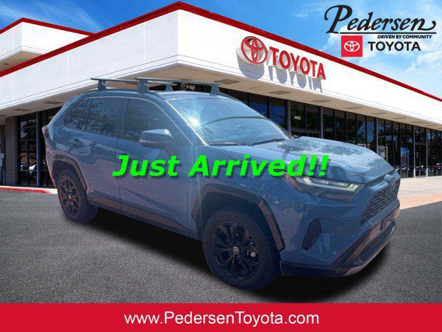 used 2022 Toyota RAV4 Hybrid car, priced at $34,300