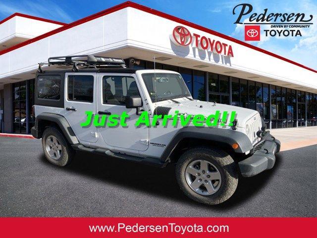 used 2014 Jeep Wrangler Unlimited car, priced at $18,990