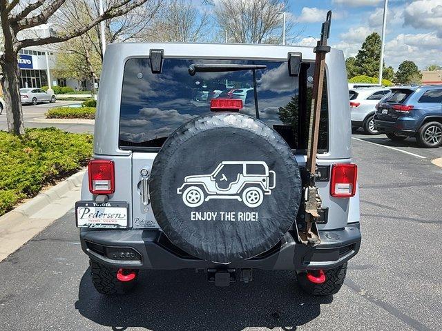 used 2014 Jeep Wrangler Unlimited car, priced at $16,690