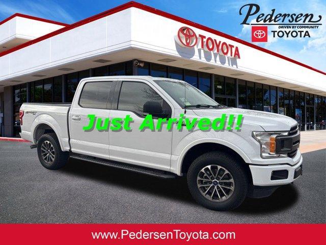 used 2018 Ford F-150 car, priced at $26,890