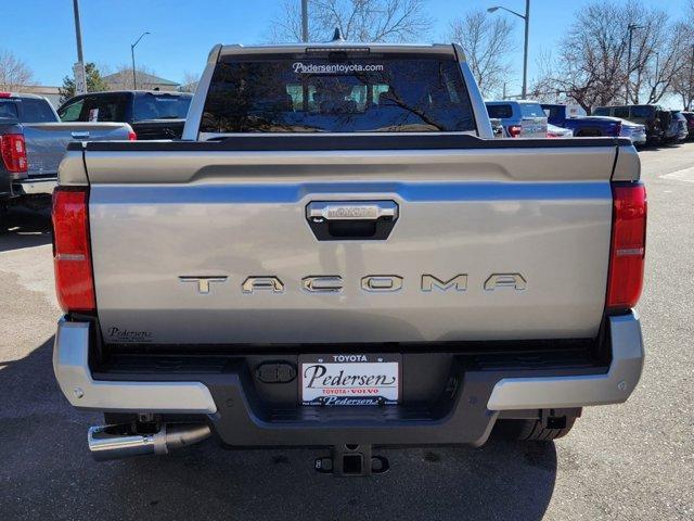 used 2024 Toyota Tacoma car, priced at $50,990