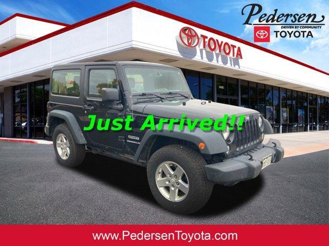 used 2015 Jeep Wrangler car, priced at $16,390