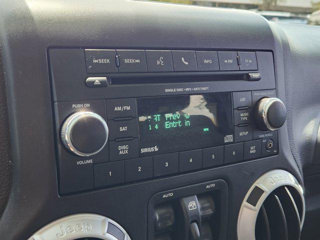 used 2012 Jeep Wrangler Unlimited car, priced at $15,300