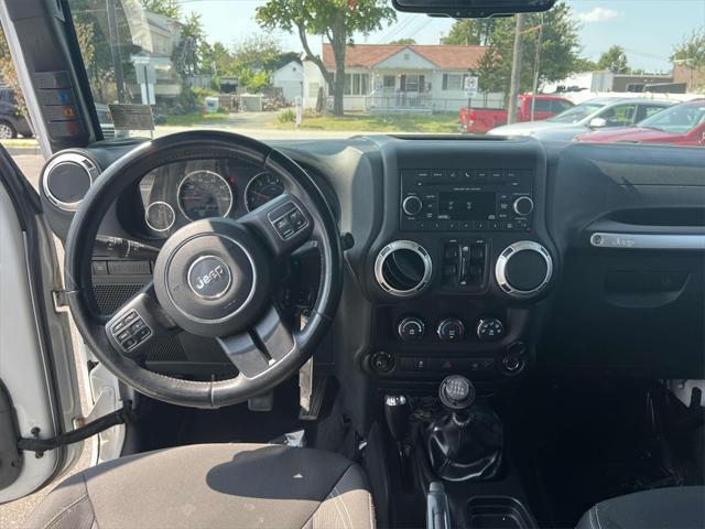 used 2016 Jeep Wrangler Unlimited car, priced at $25,595