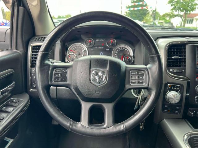 used 2018 Ram 1500 car, priced at $29,491