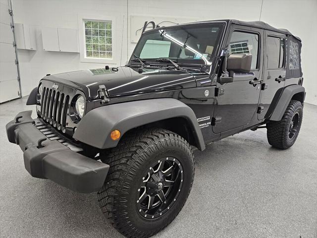 used 2015 Jeep Wrangler Unlimited car, priced at $19,495