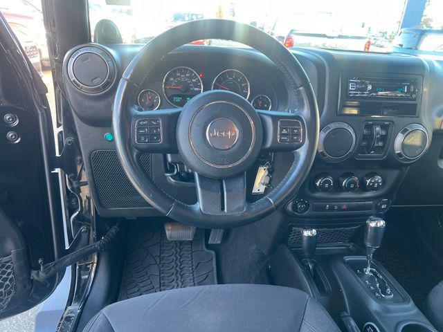 used 2013 Jeep Wrangler Unlimited car, priced at $13,397