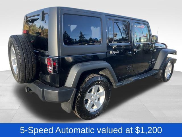 used 2013 Jeep Wrangler Unlimited car, priced at $13,397