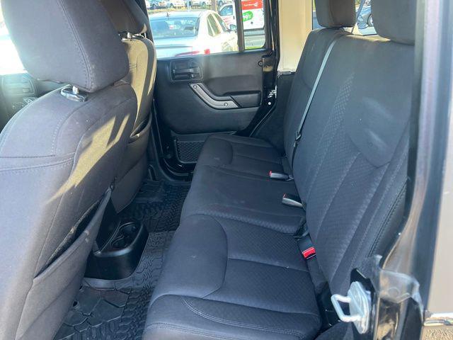 used 2013 Jeep Wrangler Unlimited car, priced at $13,397