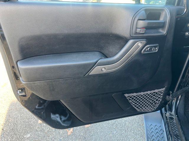 used 2013 Jeep Wrangler Unlimited car, priced at $13,397