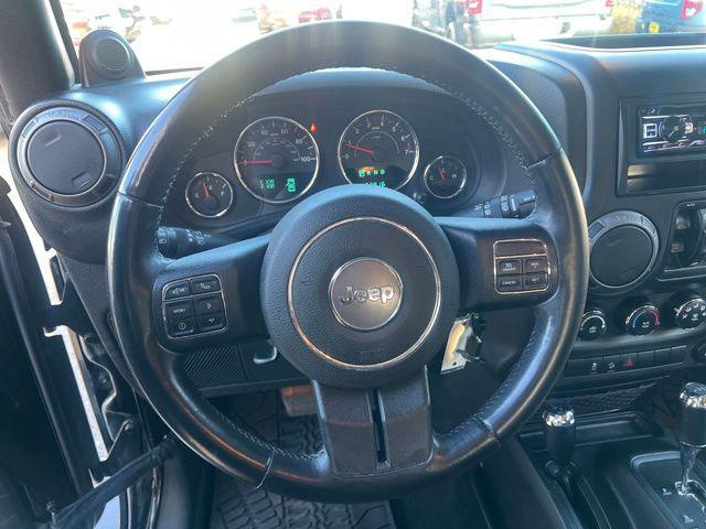 used 2013 Jeep Wrangler Unlimited car, priced at $13,397