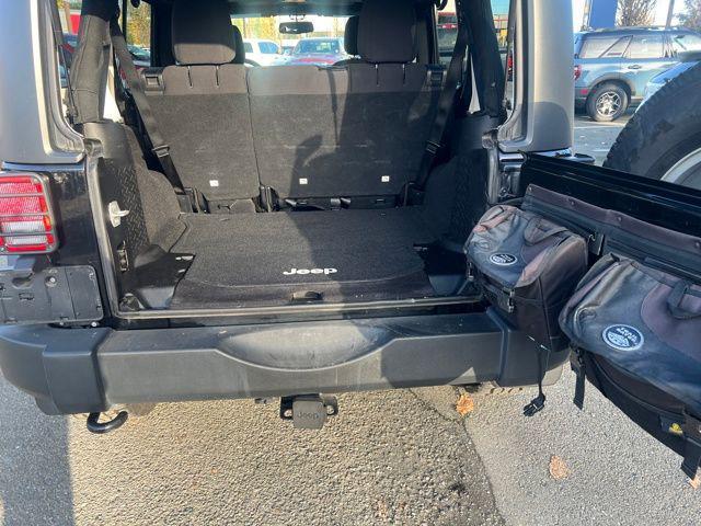 used 2013 Jeep Wrangler Unlimited car, priced at $13,397