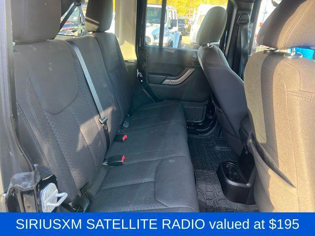 used 2013 Jeep Wrangler Unlimited car, priced at $13,397