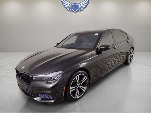 used 2016 BMW 740 car, priced at $21,289