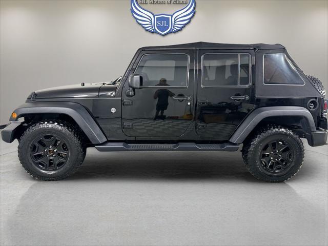 used 2018 Jeep Wrangler JK Unlimited car, priced at $26,889