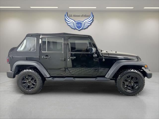 used 2018 Jeep Wrangler JK Unlimited car, priced at $22,999