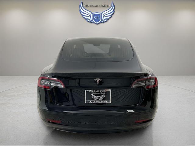 used 2022 Tesla Model 3 car, priced at $19,499