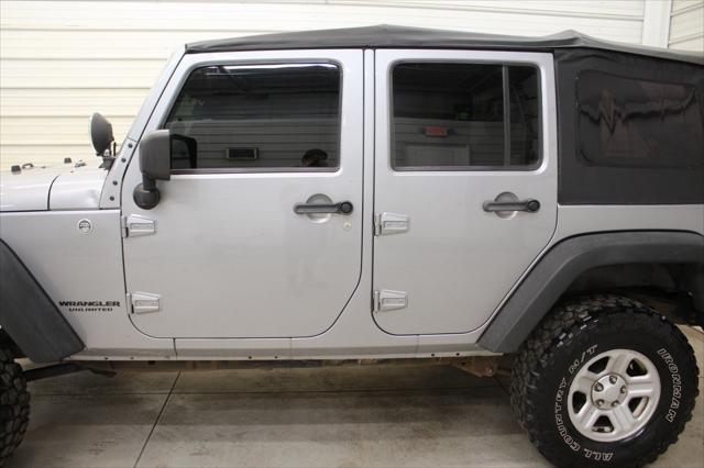 used 2013 Jeep Wrangler Unlimited car, priced at $12,295