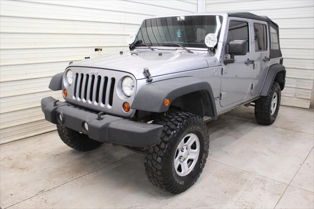 used 2013 Jeep Wrangler Unlimited car, priced at $12,295