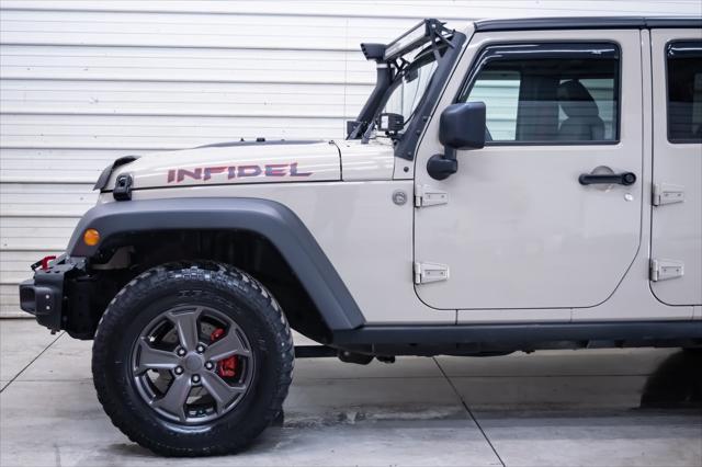 used 2018 Jeep Wrangler JK Unlimited car, priced at $31,495