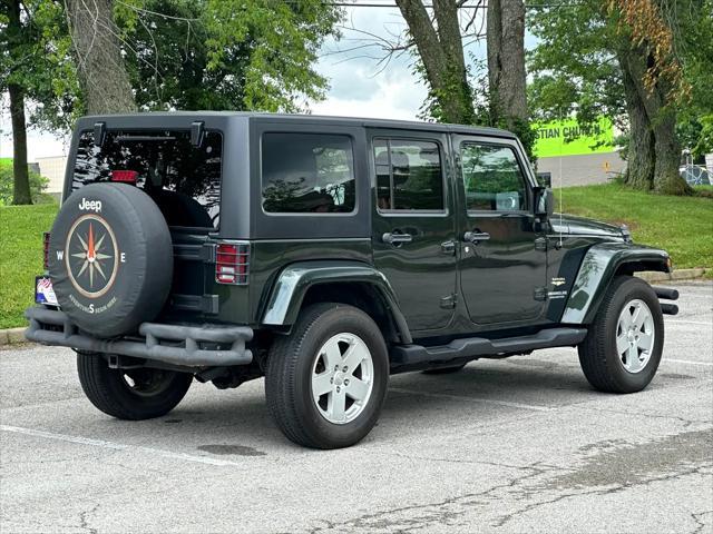 used 2011 Jeep Wrangler Unlimited car, priced at $16,976