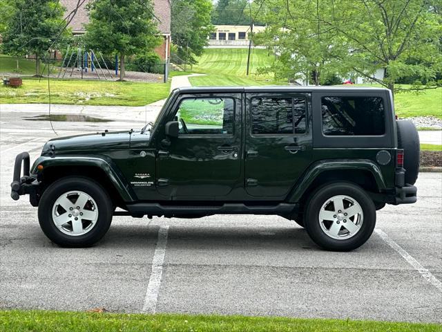 used 2011 Jeep Wrangler Unlimited car, priced at $16,976