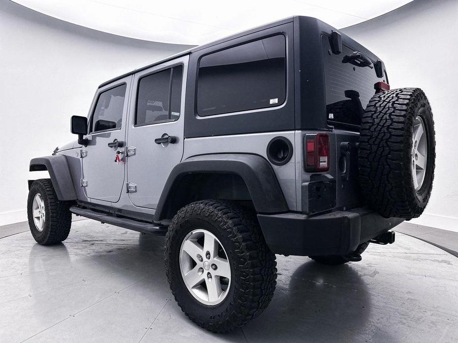 used 2013 Jeep Wrangler Unlimited car, priced at $15,980