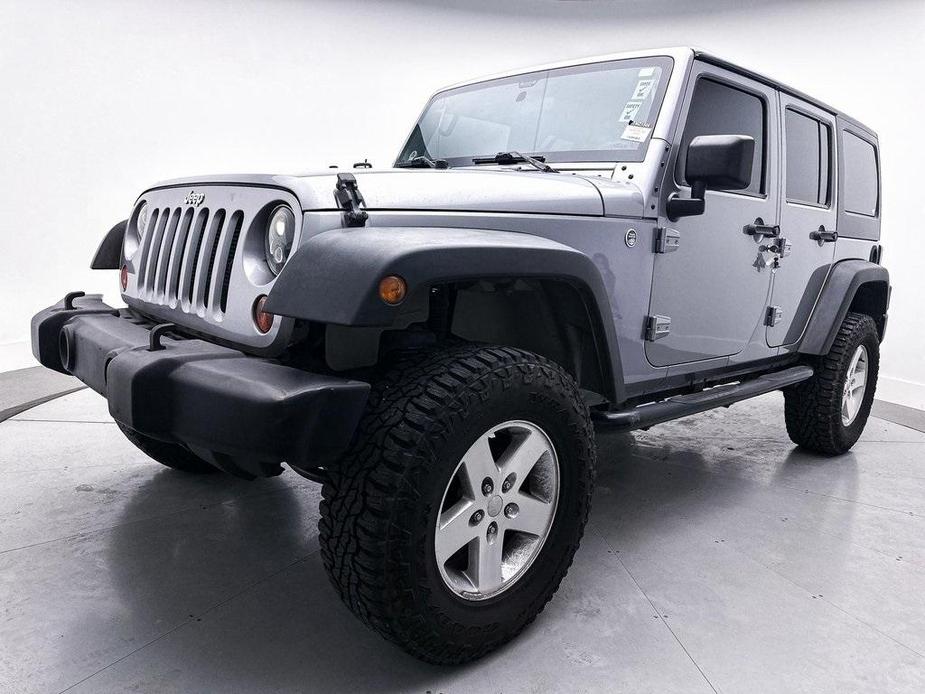 used 2013 Jeep Wrangler Unlimited car, priced at $15,980