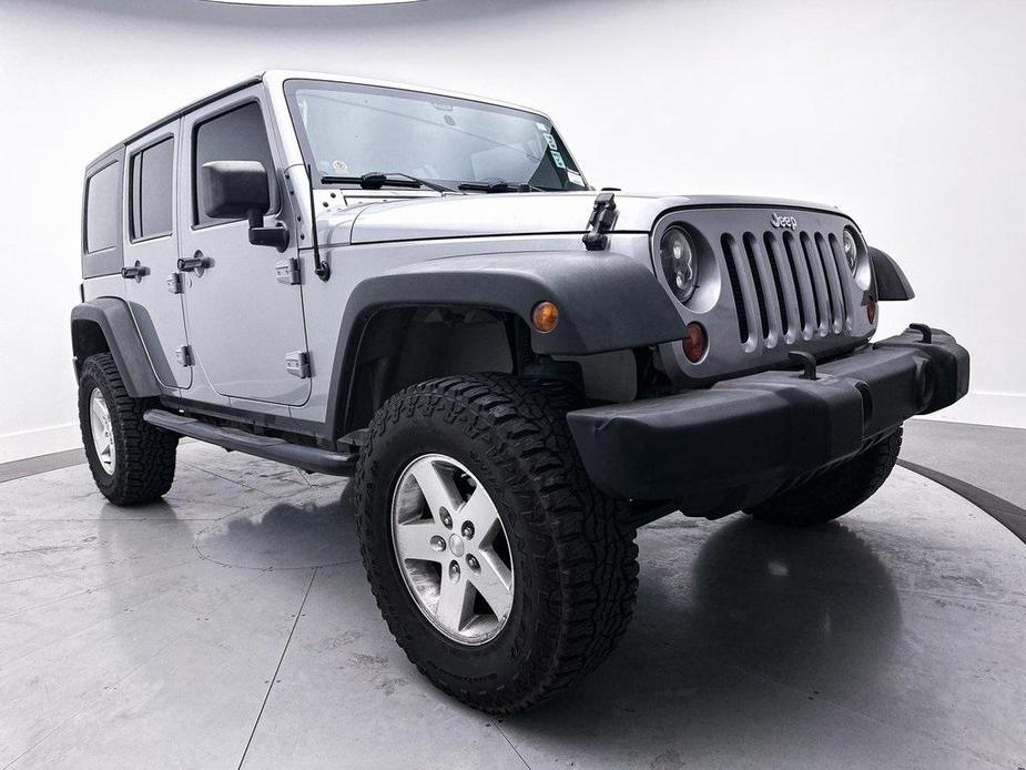 used 2013 Jeep Wrangler Unlimited car, priced at $15,980