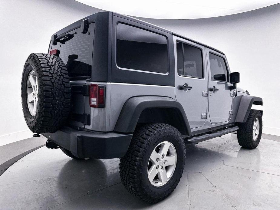 used 2013 Jeep Wrangler Unlimited car, priced at $15,980