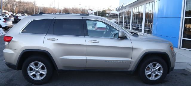 used 2014 Jeep Grand Cherokee car, priced at $14,299