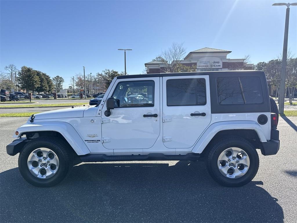 used 2014 Jeep Wrangler Unlimited car, priced at $16,550