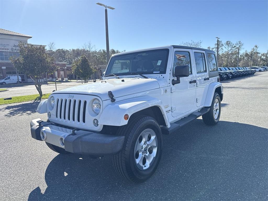 used 2014 Jeep Wrangler Unlimited car, priced at $16,550