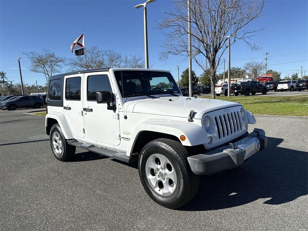 used 2014 Jeep Wrangler Unlimited car, priced at $16,550