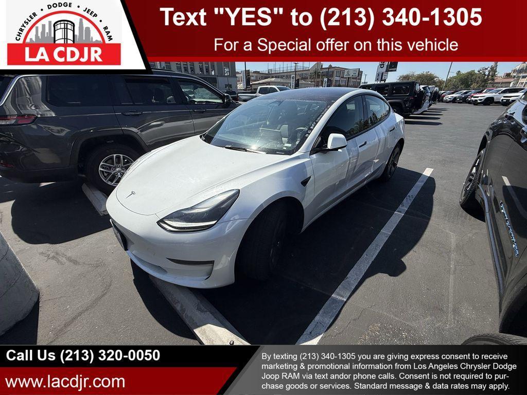 used 2023 Tesla Model 3 car, priced at $20,999