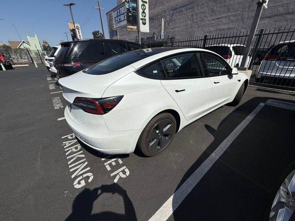 used 2023 Tesla Model 3 car, priced at $20,999
