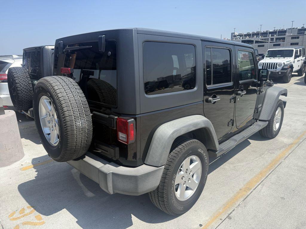 used 2016 Jeep Wrangler Unlimited car, priced at $20,419