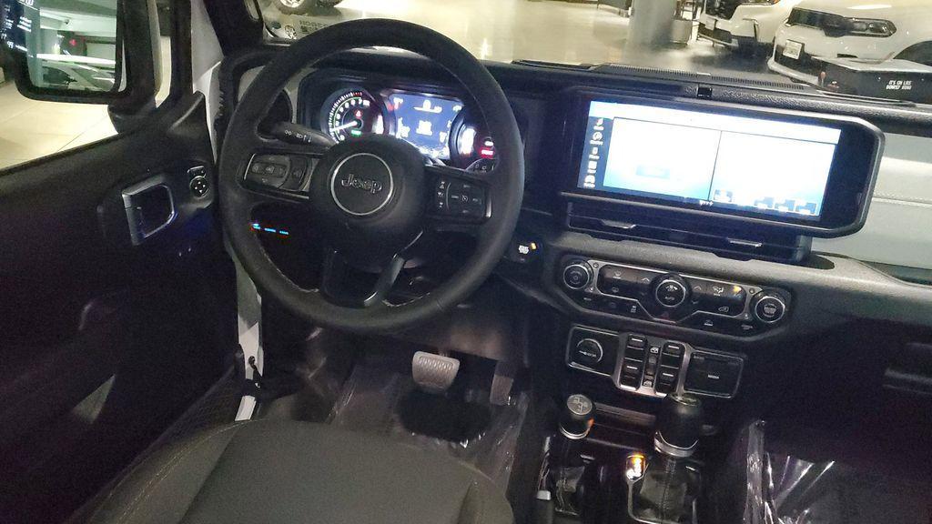 used 2024 Jeep Wrangler 4xe car, priced at $30,919
