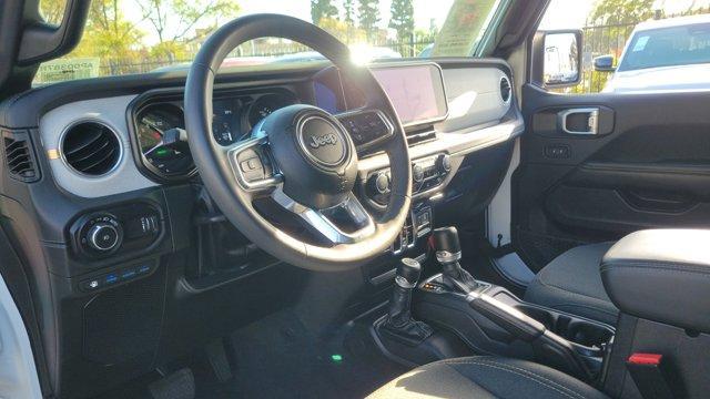 used 2024 Jeep Wrangler 4xe car, priced at $35,919