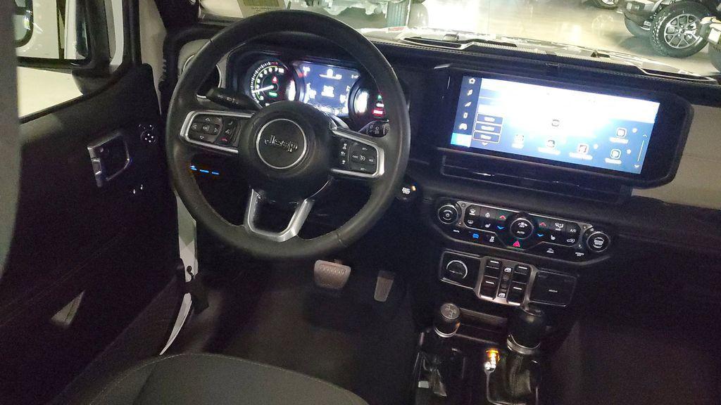 used 2024 Jeep Wrangler 4xe car, priced at $29,919