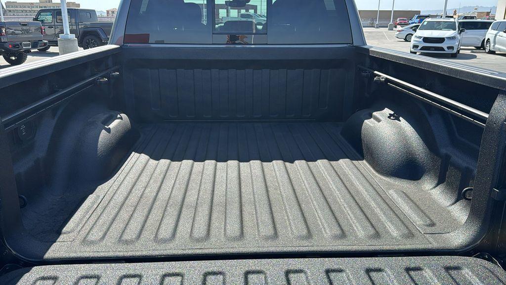new 2025 Ram 1500 car, priced at $49,995