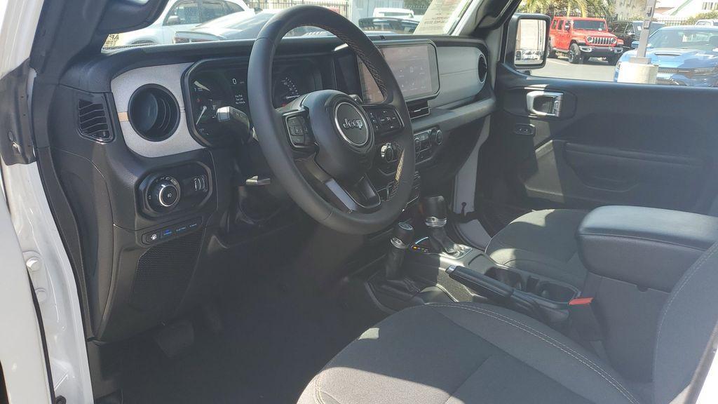used 2024 Jeep Wrangler 4xe car, priced at $30,919