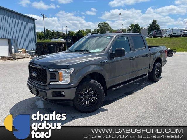 used 2018 Ford F-150 car, priced at $23,814