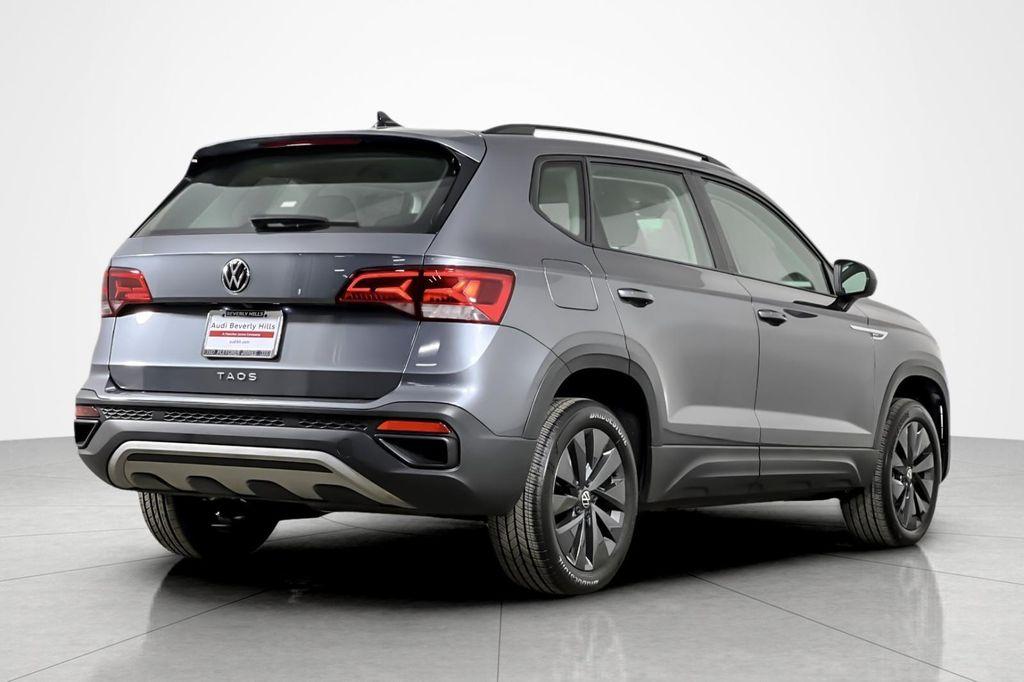 used 2023 Volkswagen Taos car, priced at $19,994