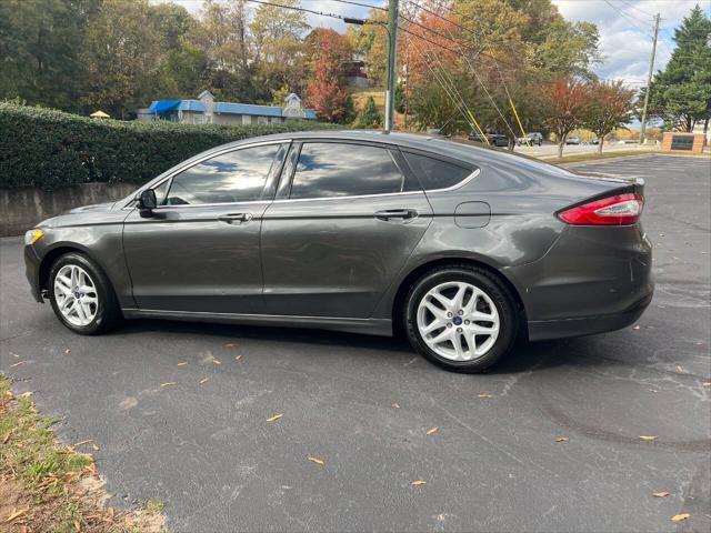 used 2016 Ford Fusion car, priced at $4,900