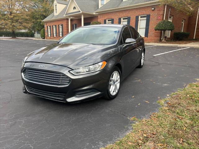 used 2016 Ford Fusion car, priced at $4,900